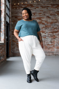 Ashley wearing a Strata Top and Arenite Pants