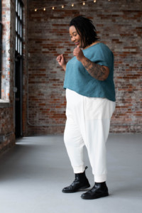 Ashley wearing a Strata Top and Arenite Pants