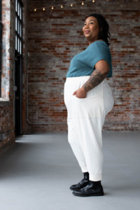 Ashley wearing a Strata Top and Arenite Pants