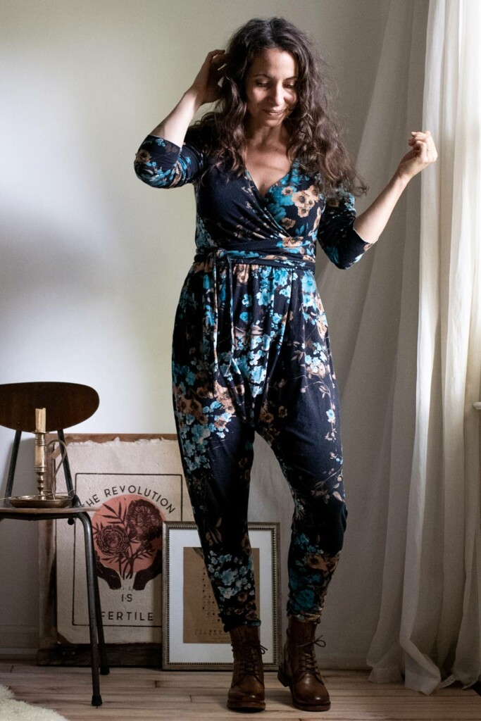 Meg wears a dark floral knit Talam Jumpsuit sewing pattern.