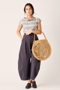 A model wears purple fly front arthur pants