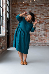 Ashley wearing a teal Hinterland Dress