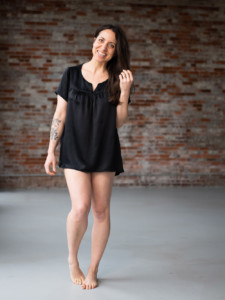 Meg wears a sill charmuese nocturne top
