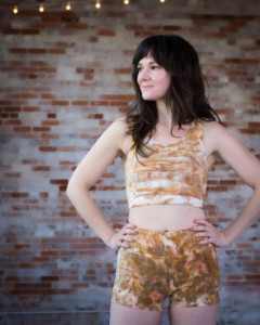 Meredith wears a golden ice dyed Limestone shortie and top set