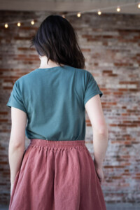The back of Meredith's Bedrock Tee