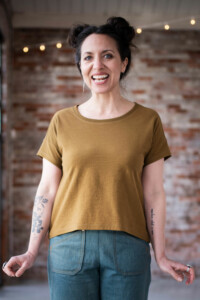 Meg wearing a Bedrock Tee