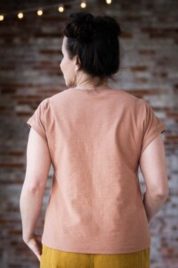 The back of Meg's Bedrock Tee