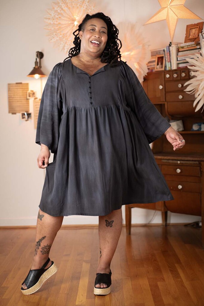 Ashley wears a charcoal Greenbrier Dress