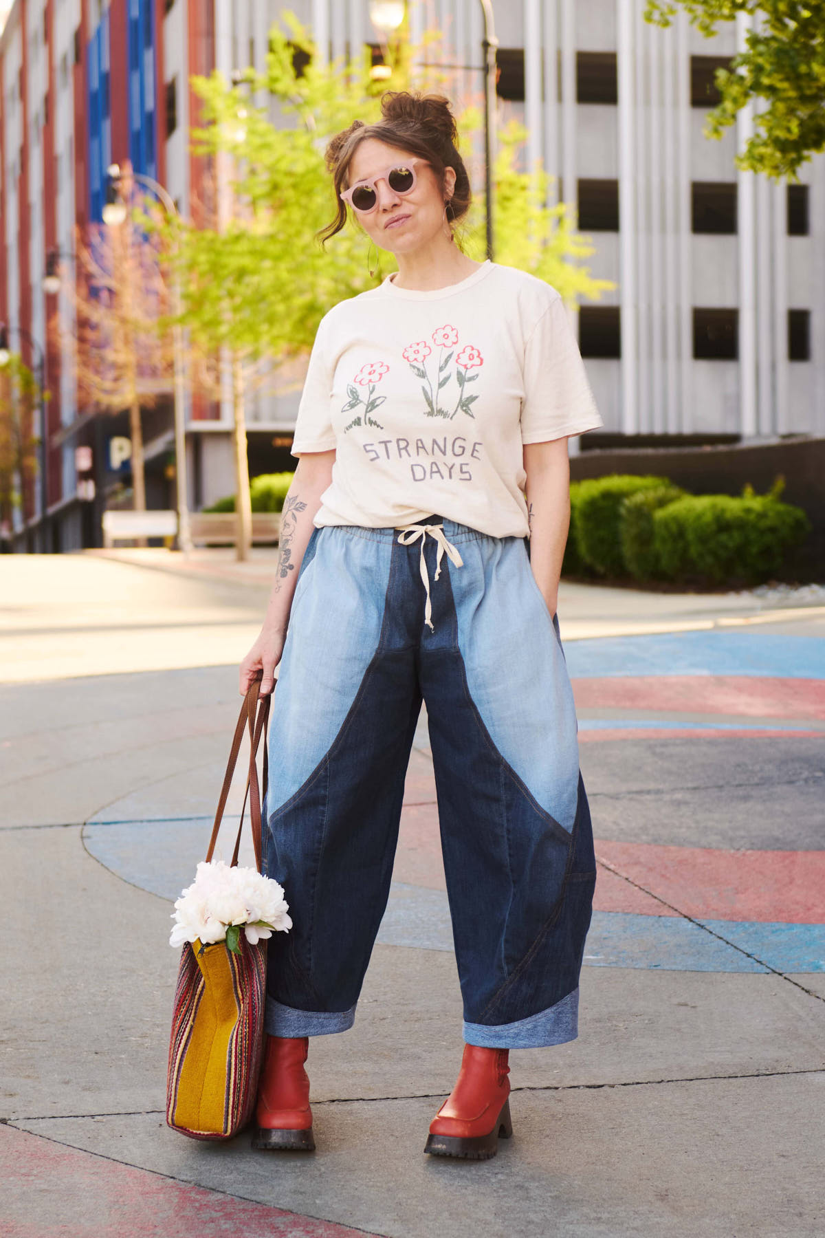 Meg wearing two toned denim barrel leg pants